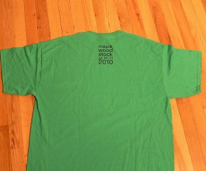 Green shirt - logo only on front, so words on back